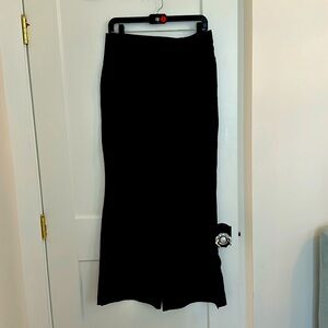 Athleta athleisure wide leg pant with slits at the cuff.